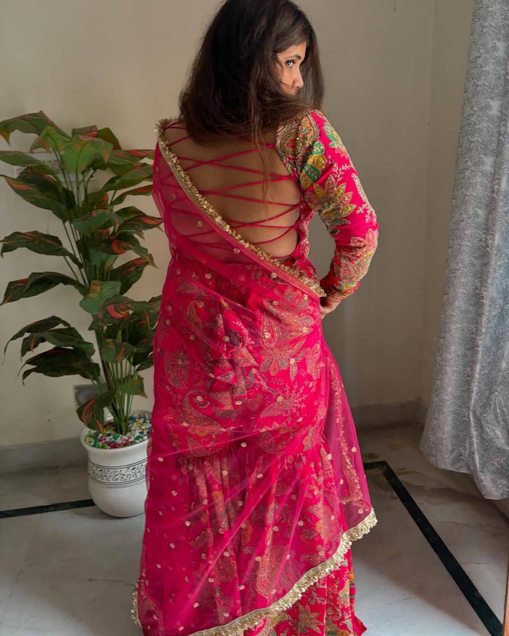 Back view of heavy Chinon suit with sequin embroidery and full flair sharara.